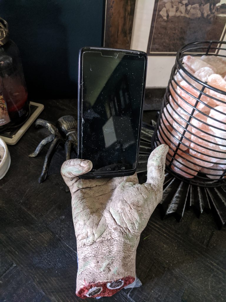 Severed Zombie Hand phone holder