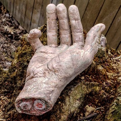 severed zombie hand phone holder