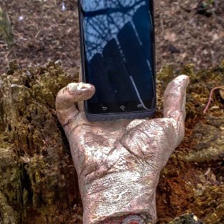 severed zombie hand phone holder